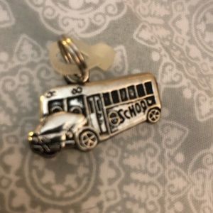 GANZ silver toned charm-school bud